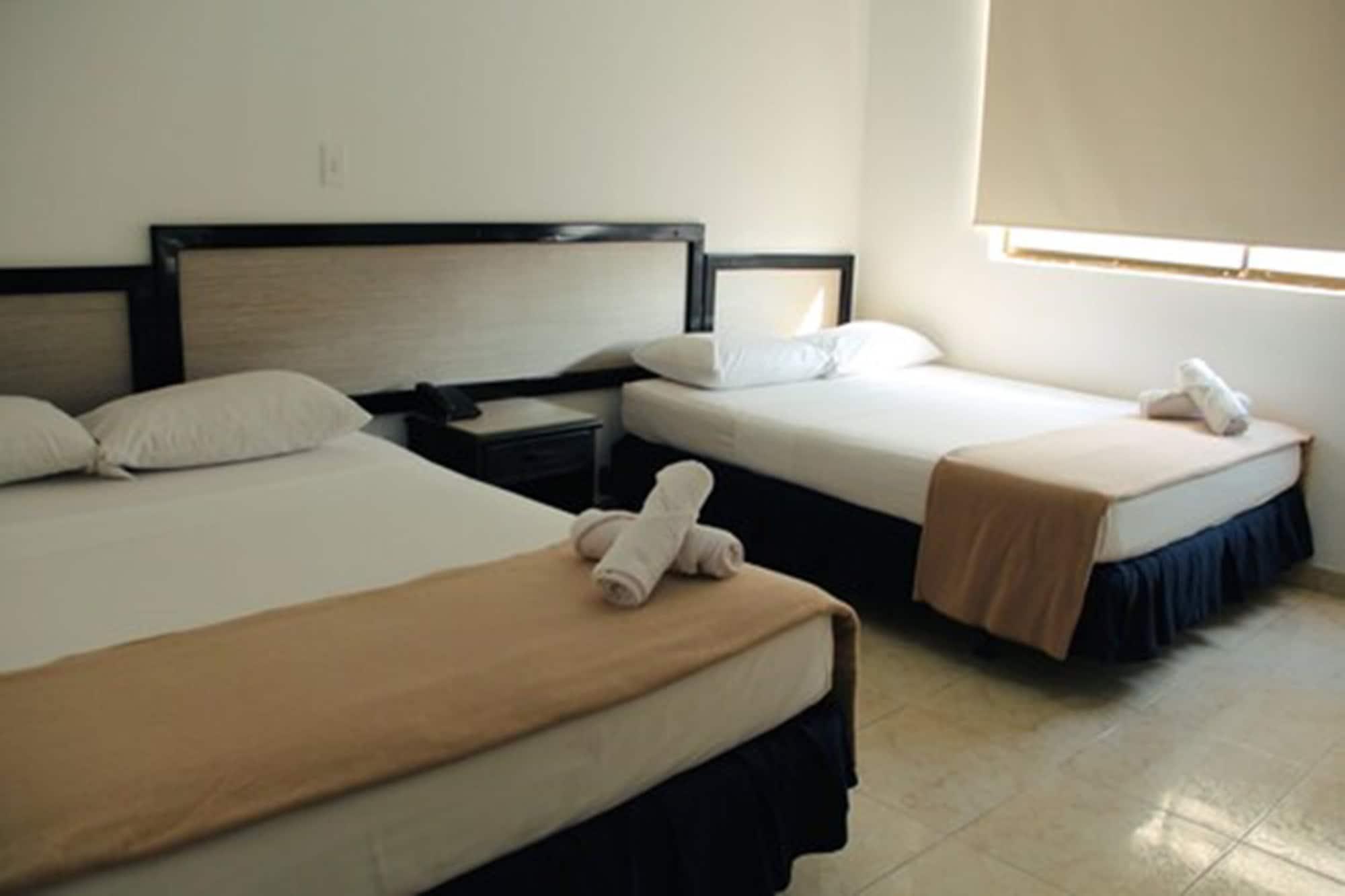 Hotel Axis Inn By Geh Suites Santa Marta  Extérieur photo